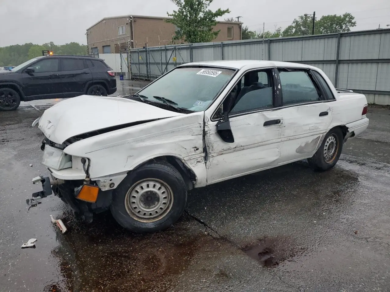 MERCURY TOPAZ 1992. Lot# 56950595. VIN 2MEPM36U1NB611321. Photo 1