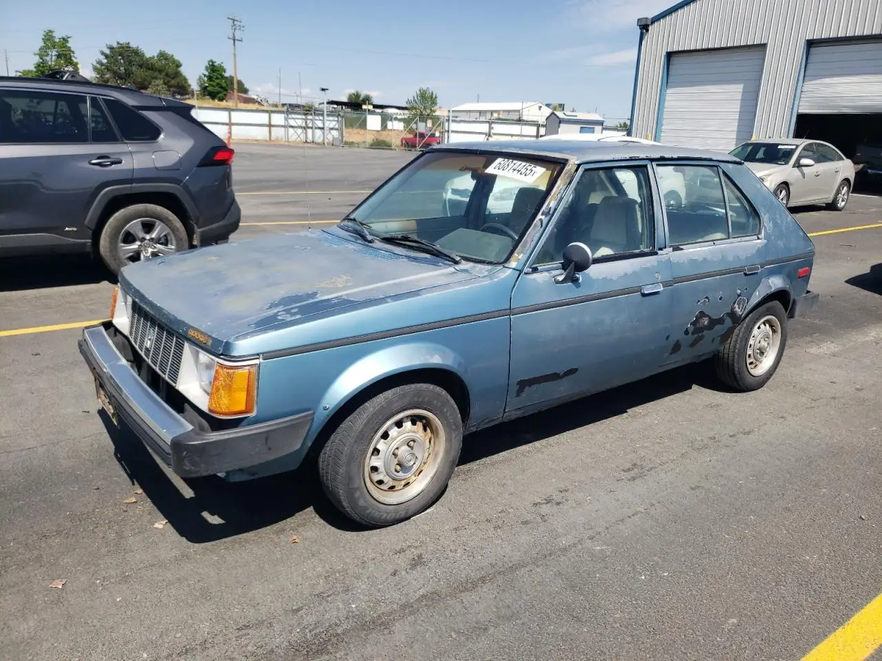 DODGE OMNI 1989. Lot# 60814455. VIN 1B3BL18D7KC474933. Photo 1