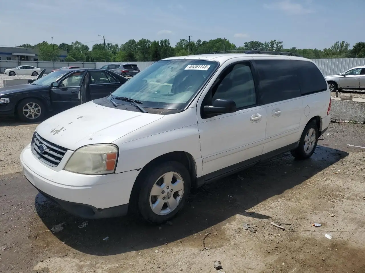 FORD FREESTAR 2004. Lot# 54261745. VIN 2FMZA57674BB07994. Photo 1