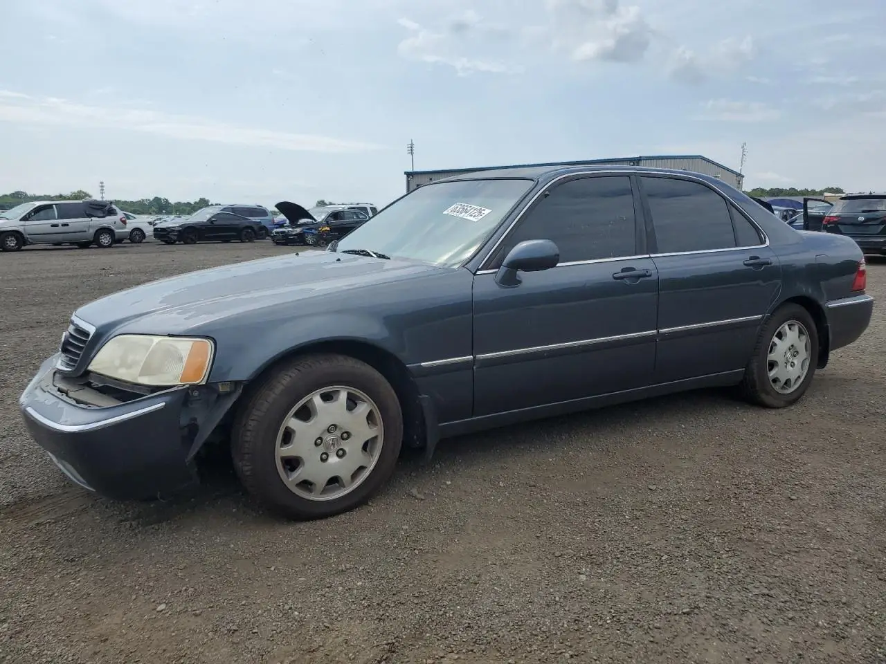 ACURA RL 2004. Lot# 63564125. VIN JH4KA96634C002401. Photo 1