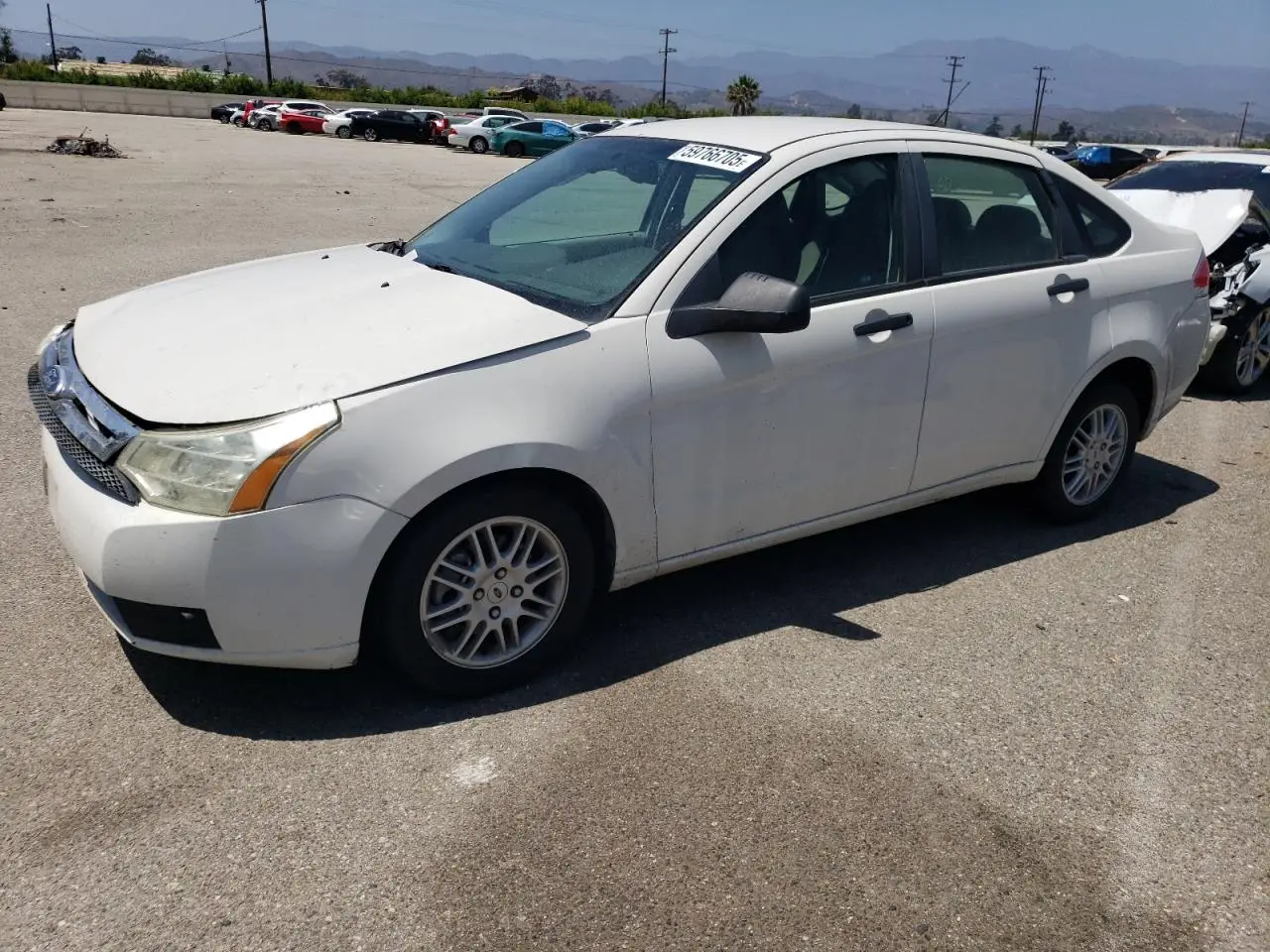 FORD FOCUS 2011. Lot# 59766705. VIN 1FAHP3FN4BW150606. Photo 1