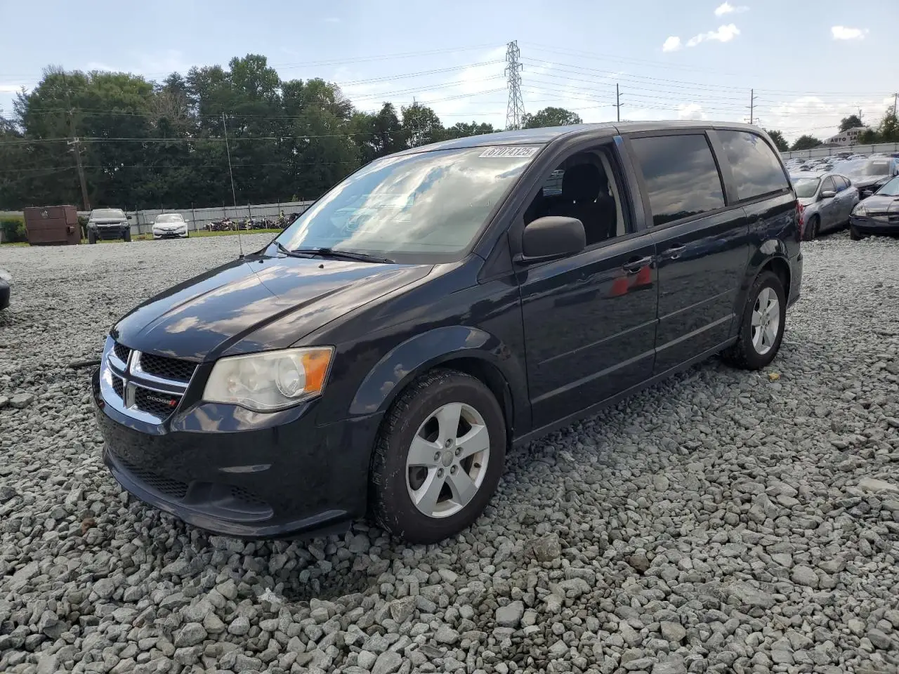 DODGE CARAVAN 2013. Lot# 67074125. VIN 2C4RDGBG2DR628197. Photo 1