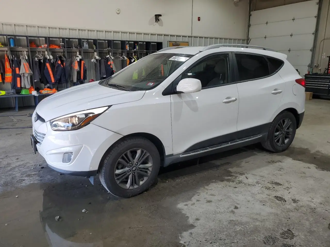 HYUNDAI TUCSON 2014. Lot# 66015735. VIN KM8JUCAG2EU806309. Photo 1