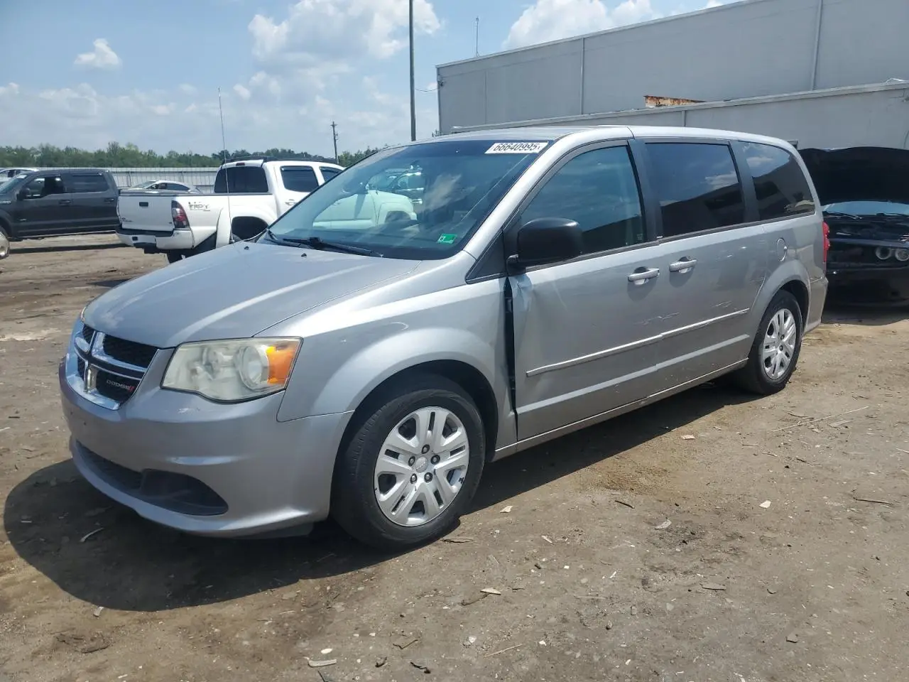 DODGE CARAVAN 2013. Lot# 66640995. VIN 2C4RDGBG8DR768447. Photo 1