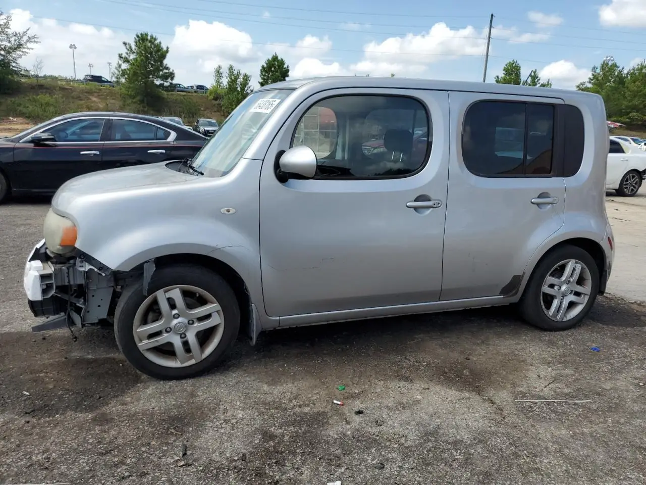 NISSAN CUBE 2009. Lot# 66438165. VIN JN8AZ28RX9T118548. Photo 1