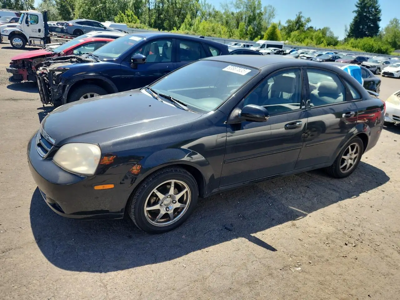 SUZUKI FORENZA 2006. Lot# 63887835. VIN KL5JD56Z56K409111. Photo 1