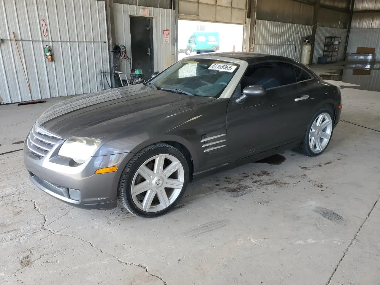 CHRYSLER CROSSFIRE 2004. Lot# 64169865. VIN 1C3AN69L24X015140. Photo 1