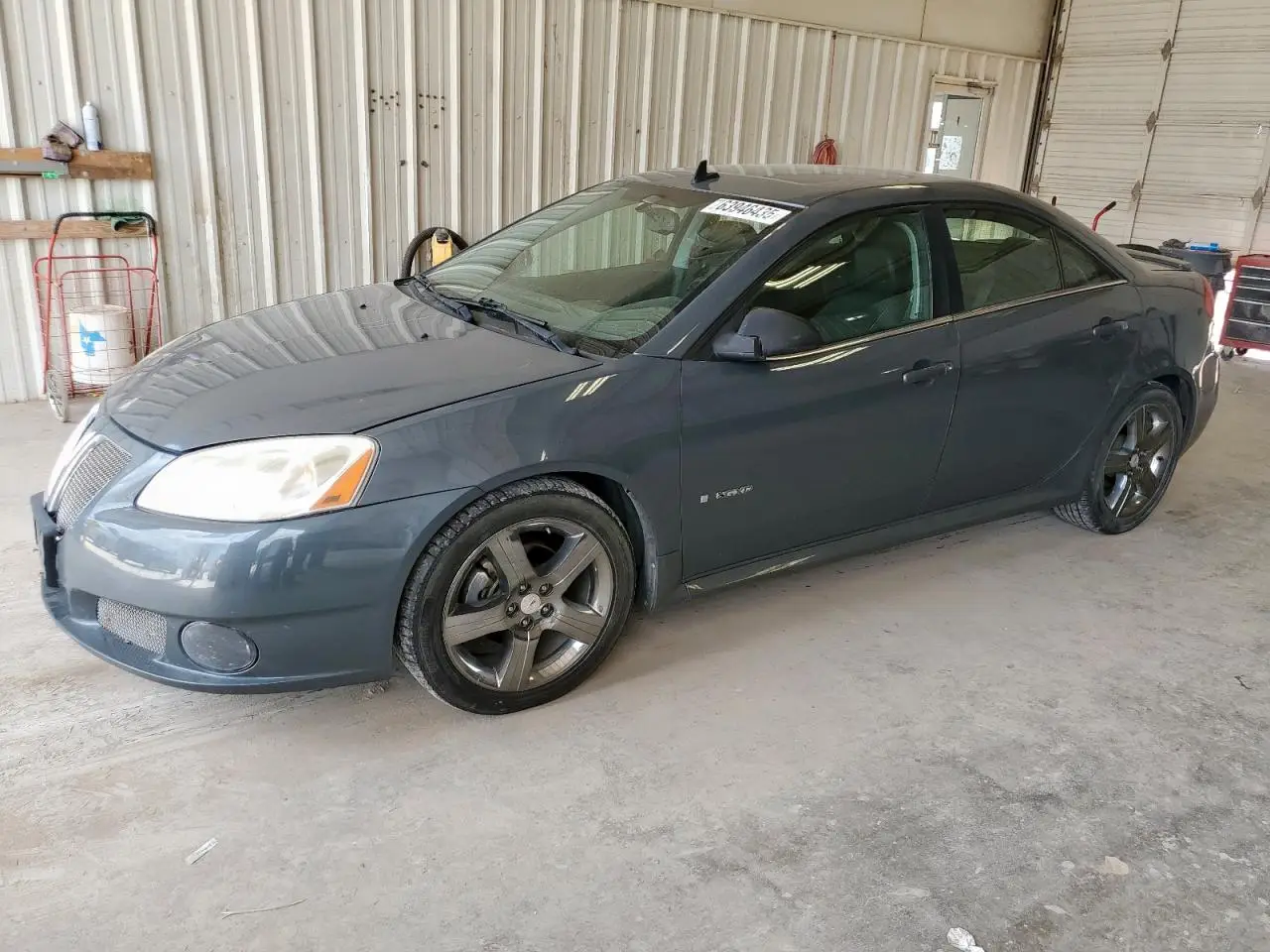PONTIAC G6 2009. Lot# 63946435. VIN 1G2ZM577594120155. Photo 1