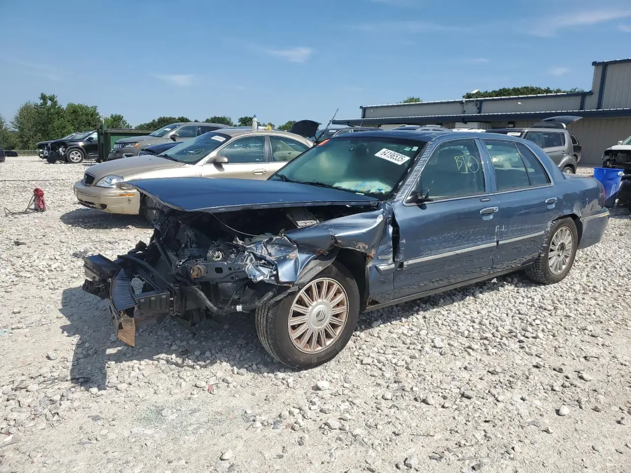 MERCURY GRMARQUIS 2010. Lot# 64196535. VIN 2MEBM7FVXAX619716. Photo 1