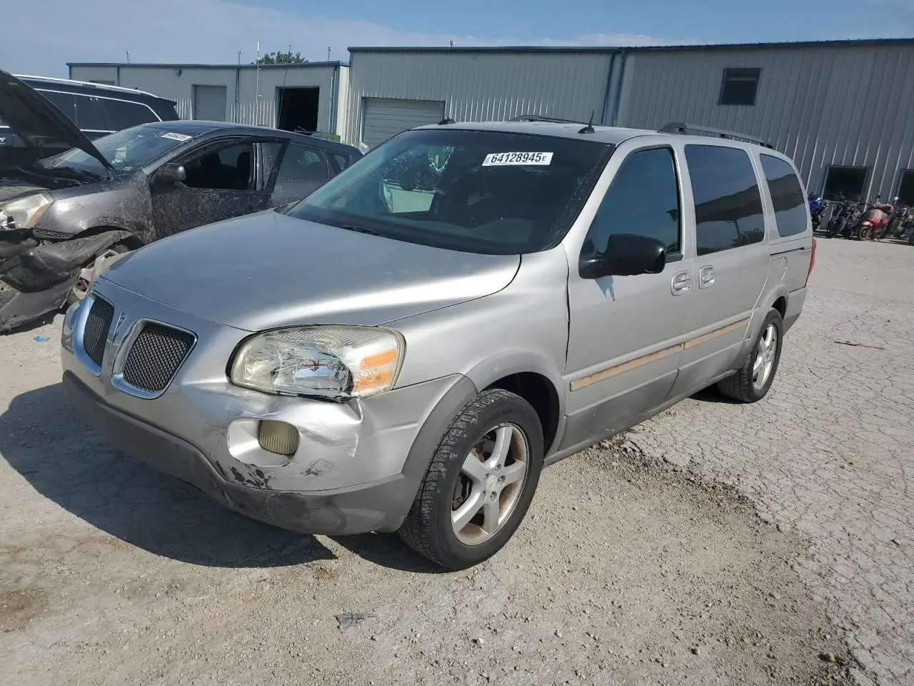 PONTIAC MONTANA 2005. Lot# 64128945. VIN 1GMDV03L55D164252. Photo 1