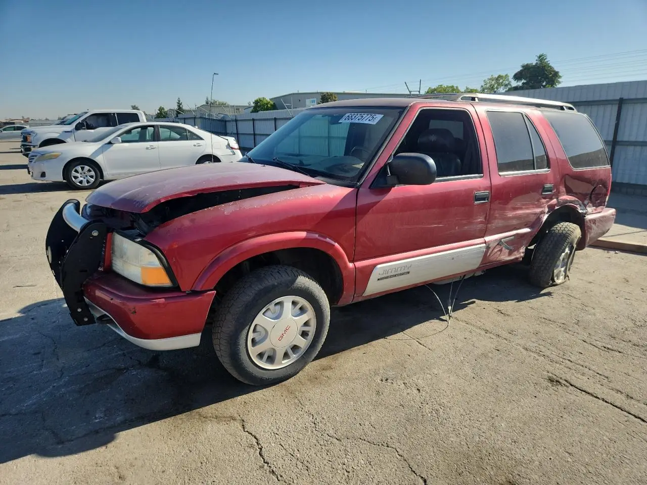 GMC JIMMY 2000. Lot# 68375775. VIN 1GKDT13W2Y2360499. Photo 1
