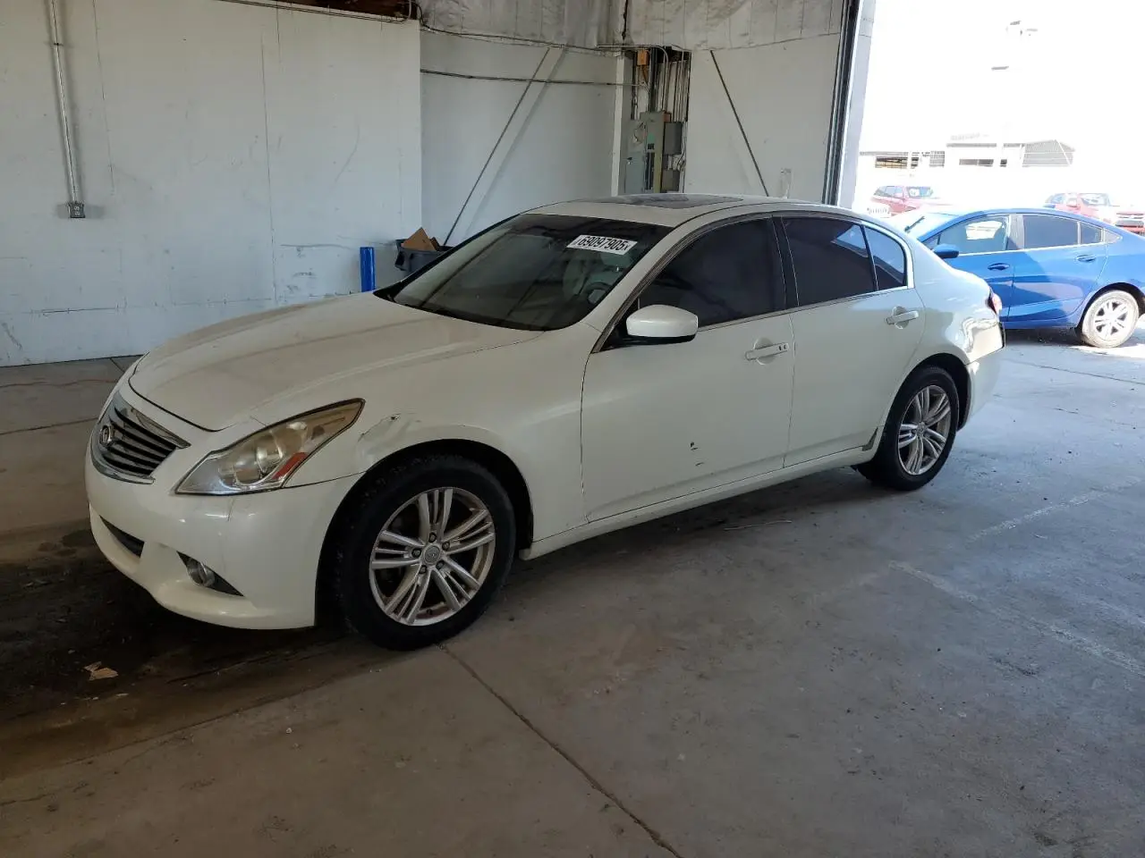 INFINITI G25 2011. Lot# 69097905. VIN JN1DV6AR7BM451380. Photo 1