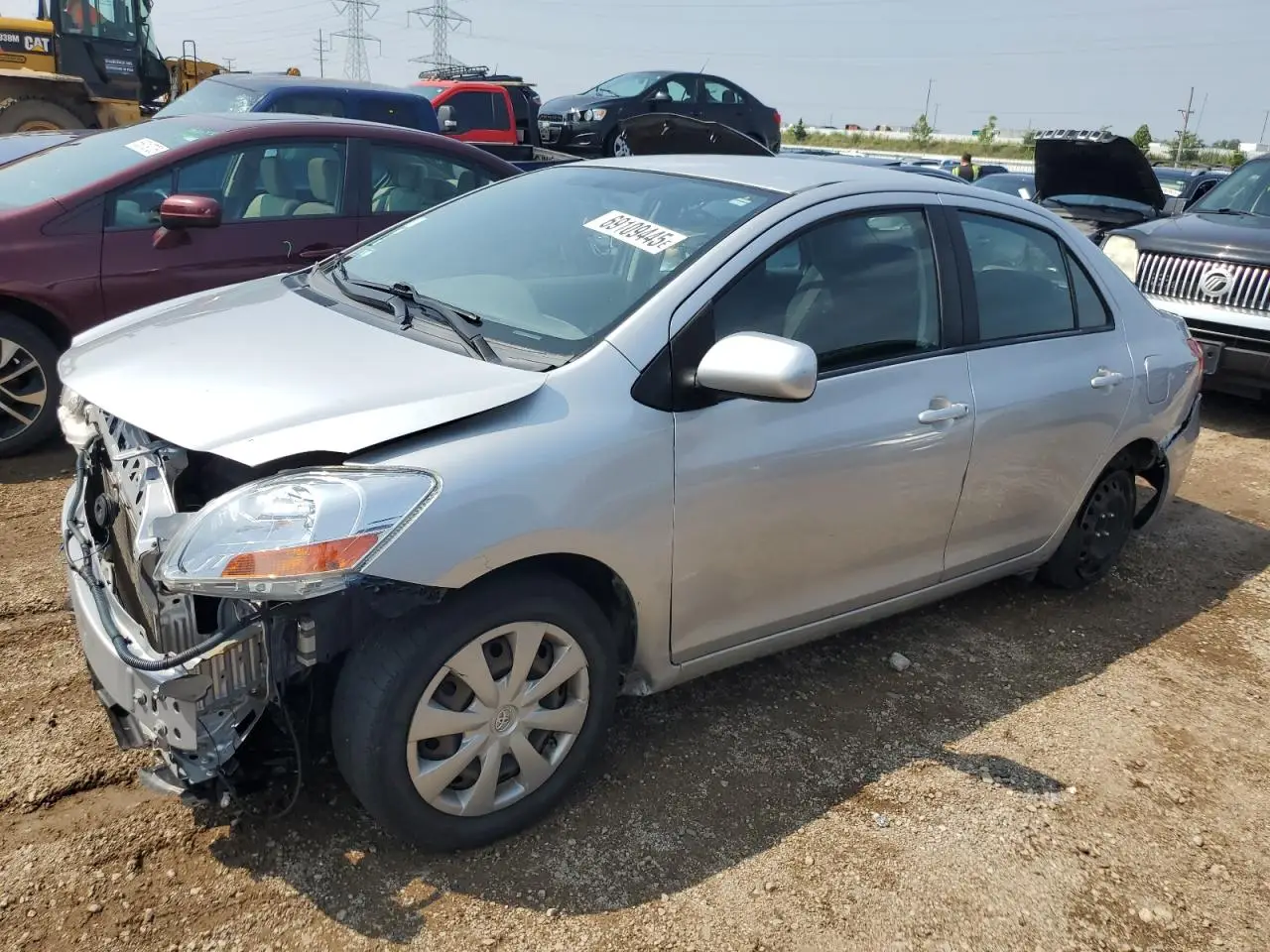 TOYOTA YARIS 2009. Lot# 69109445. VIN JTDBT903894049855. Photo 1
