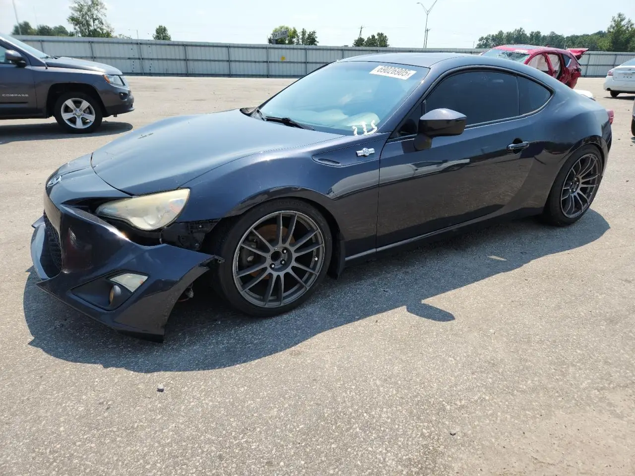 TOYOTA SCION 2013. Lot# 69026905. VIN JF1ZNAA18D1707861. Photo 1