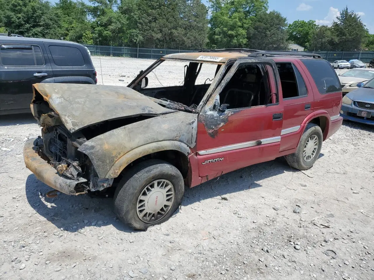 GMC JIMMY 2000. Lot# 62079865. VIN 1GKDT13W1Y2400913. Photo 1