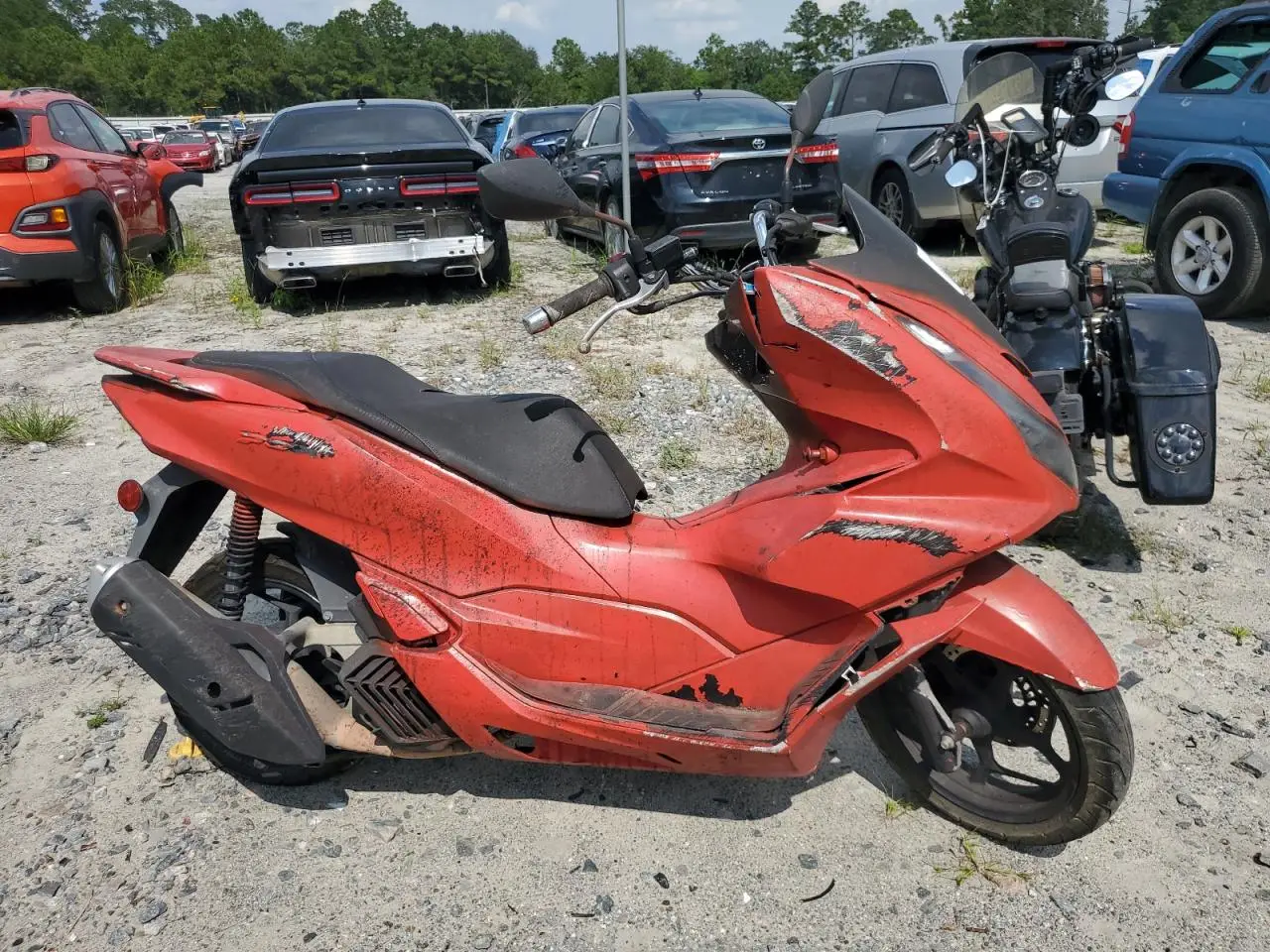 HONDA PCX 2021. Lot# 69701145. VIN RLHKF470XMY000888. Photo 1