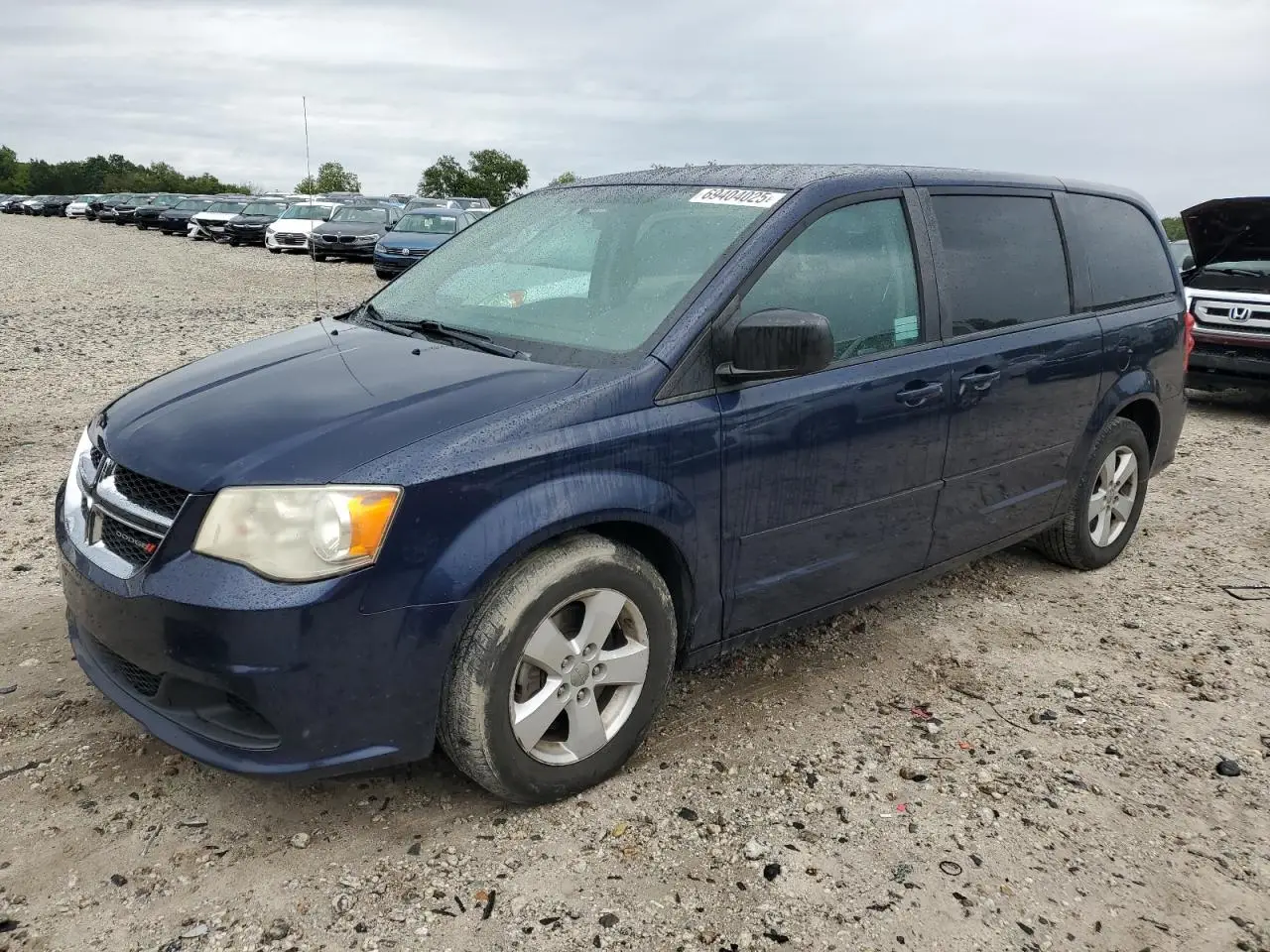 DODGE CARAVAN 2013. Lot# 69404025. VIN 2C4RDGBG7DR515782. Photo 1