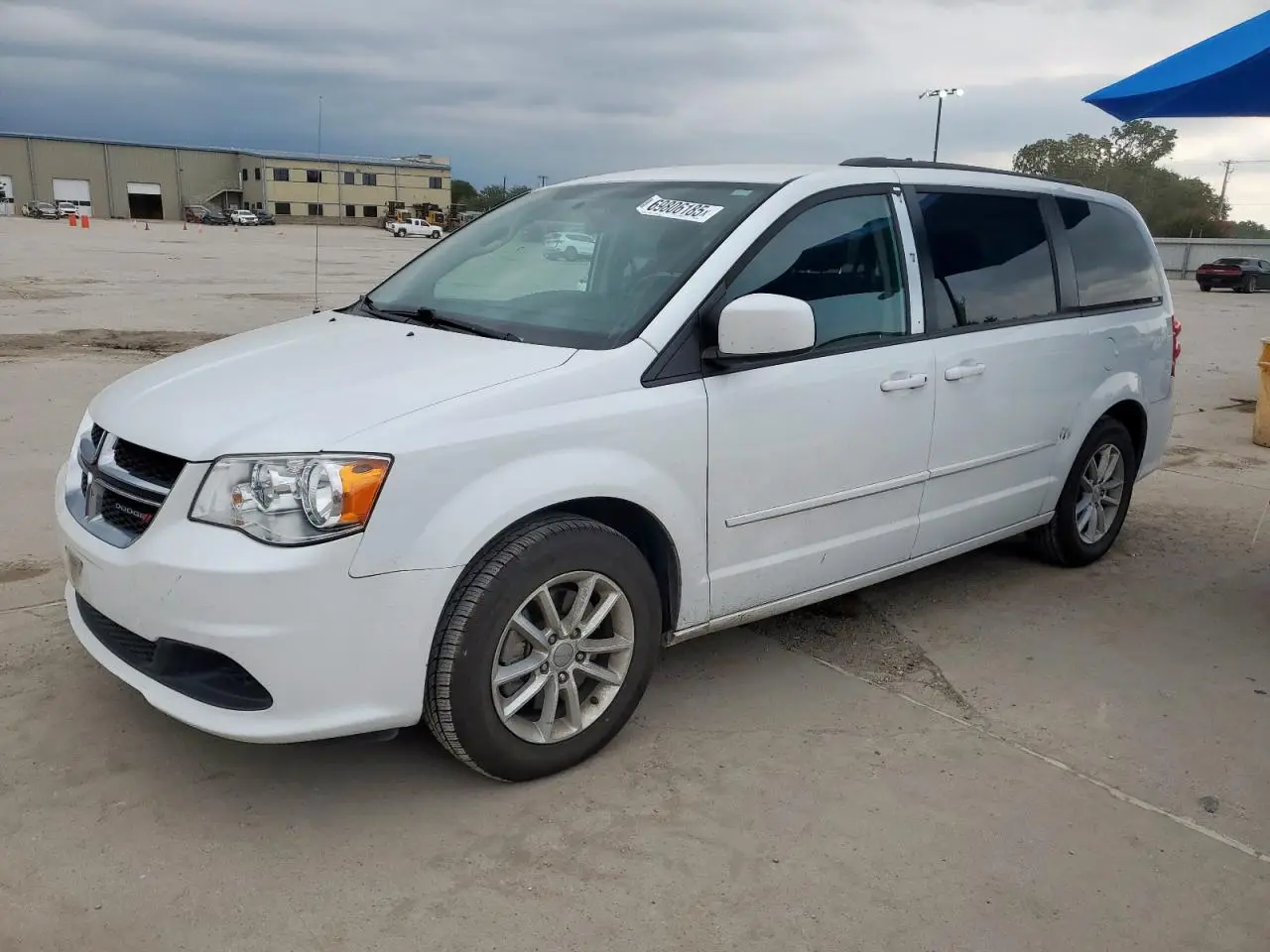 DODGE CARAVAN 2015. Lot# 69806185. VIN 2C4RDGCG9FR541592. Photo 1