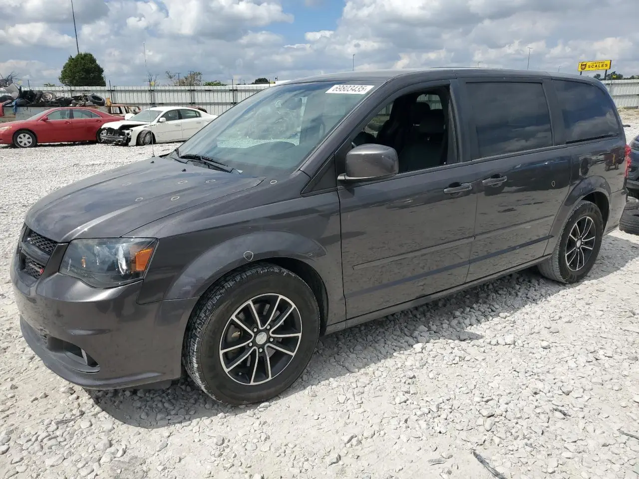 DODGE CARAVAN 2016. Lot# 69803435. VIN 2C4RDGCG4GR108568. Photo 1