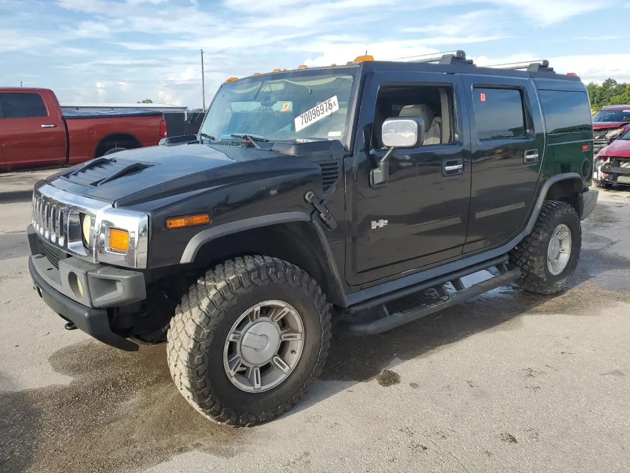 HUMMER H2 2003. Lot# 70096975. VIN 5GRGN23U93H138103. Photo 1