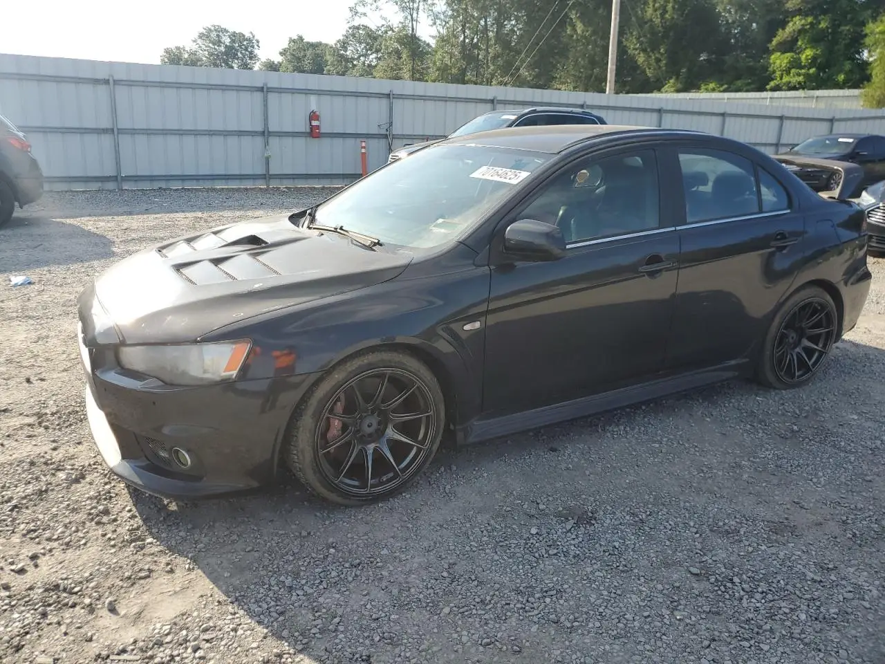 MITSUBISHI EVO 2010. Lot# 70164625. VIN JA32W5FV6AU023220. Photo 1