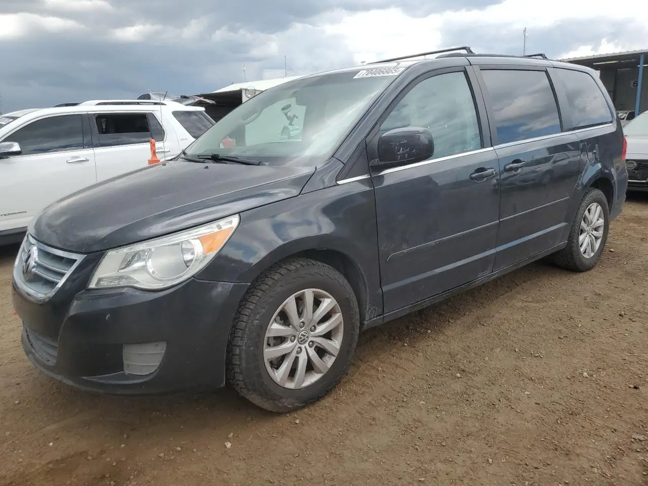 VOLKSWAGEN ROUTAN 2012. Lot# 70406865. VIN 2C4RVABG8CR240299. Photo 1