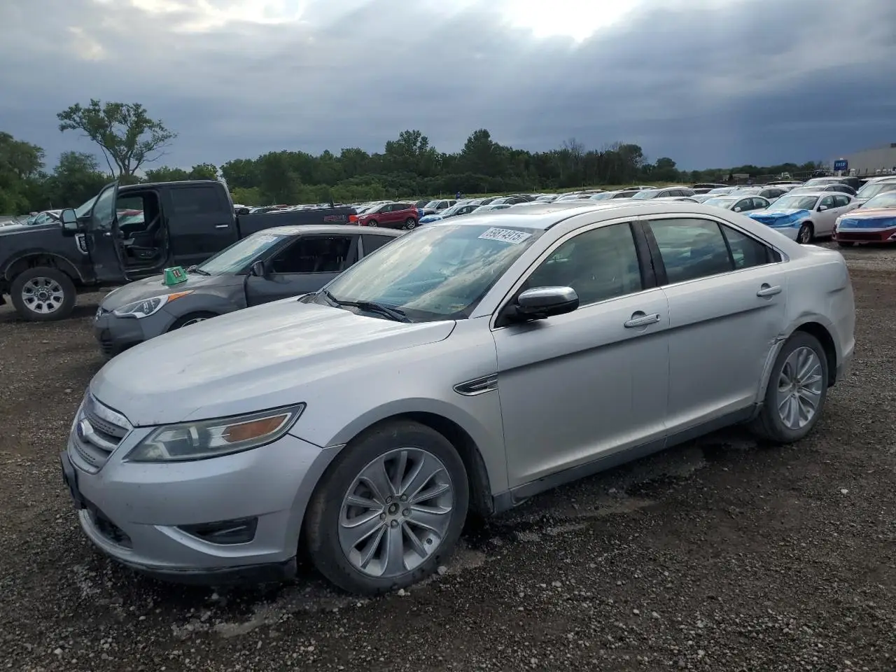 FORD TAURUS 2011. Lot# 69874915. VIN 1FAHP2FWXBG189598. Photo 1