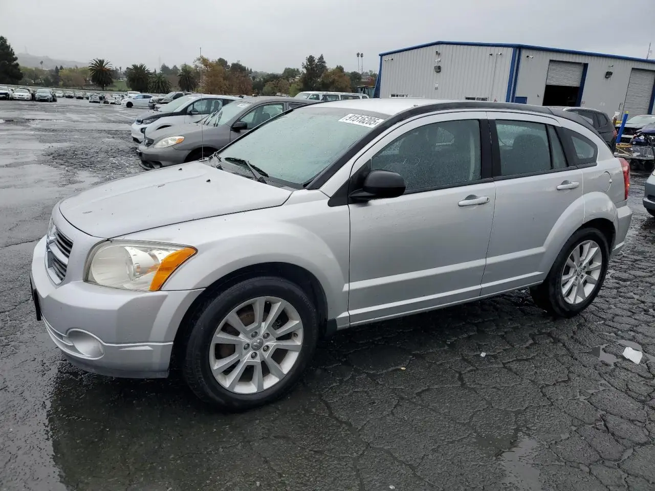DODGE CALIBER 2011. Lot# 91516205. VIN 1B3CB5HA4BD254163. Photo 1