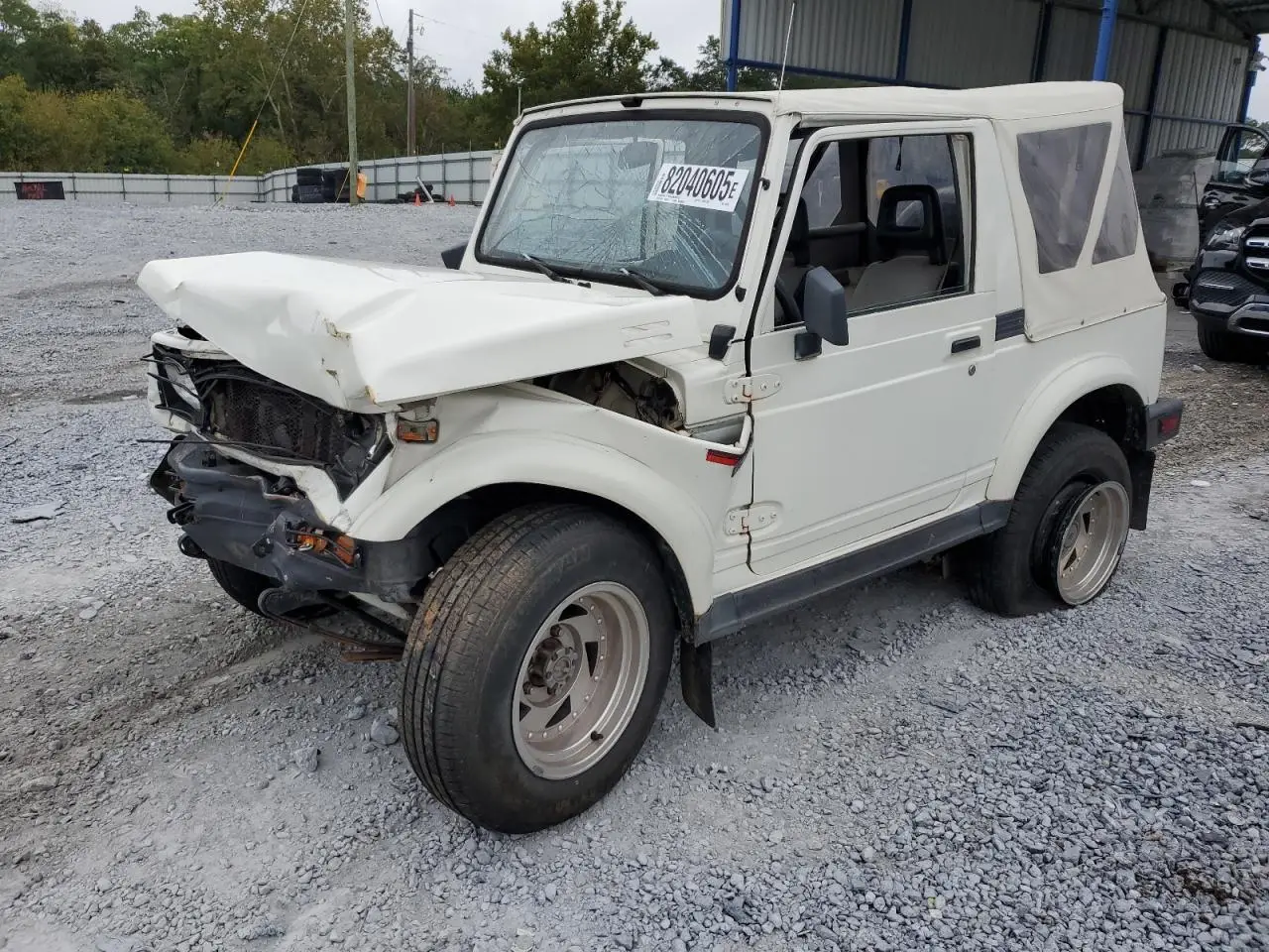SUZUKI SAMURAI 1987. Lot# 82040605. VIN JS3JC51C6H4157426. Photo 1