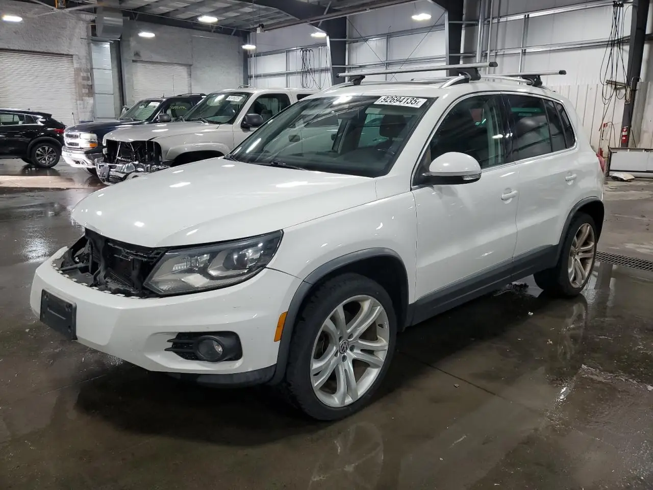 VOLKSWAGEN TIGUAN 2012. Lot# 92694135. VIN WVGBV7AX8CW558626. Photo 1