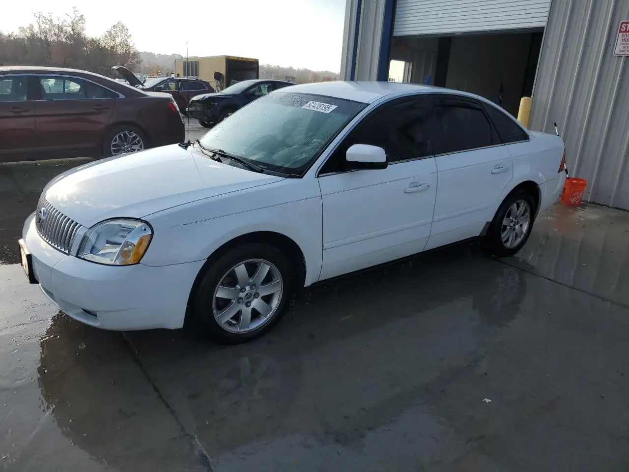 MERCURY MONTEGO 2005. Lot# 92436195. VIN 1MEFM40105G613585. Photo 1