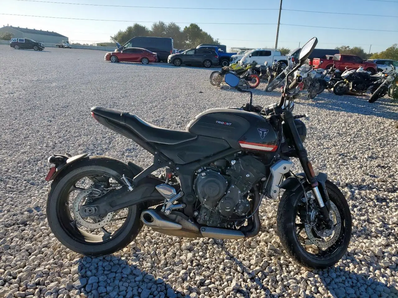TRIUMPH MOTORCYCLE TRIDENT 66 2022. Lot# 92035535. VIN SMTL10UL4NTAU7539. Photo 1