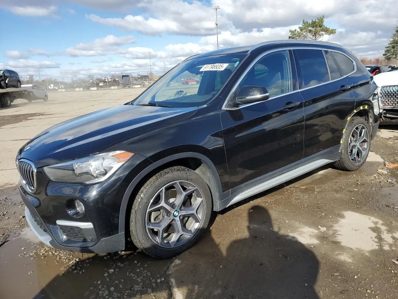 BMW X1 2019. Lot# 91798935. VIN WBXHT3C5XK3H36888. Photo 1